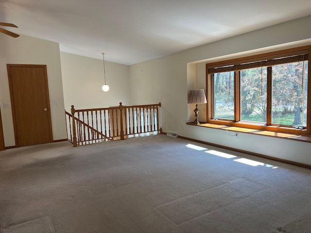14289 Memorywood Dr, Baxter, MN 56425 - empty room with carpet floors, baseboards, a ceiling fan, and lofted ceiling