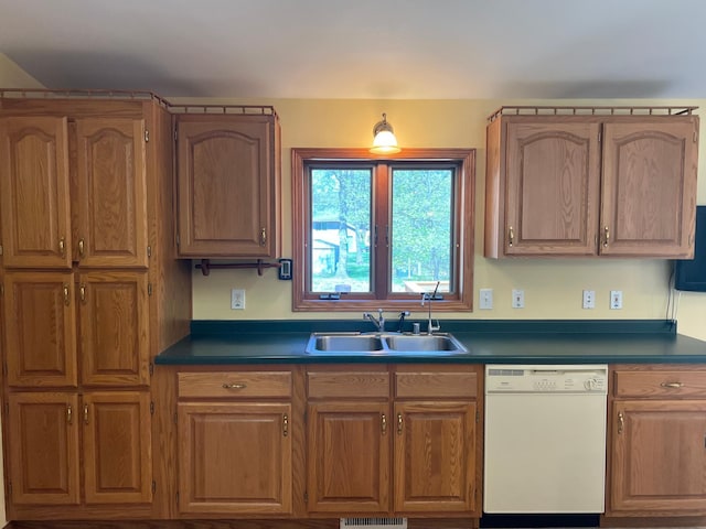 14289 Memorywood Dr, Baxter, MN 56425 - kitchen with dishwasher, a sink, dark countertops, and brown cabinets