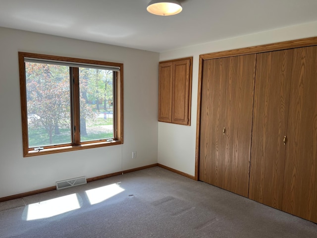 14289 Memorywood Dr, Baxter, MN 56425 - unfurnished bedroom with light colored carpet and baseboards