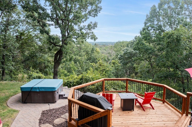 8440 Delaney Ct, Inver Grove Heights, MN 55076 - deck with a hot tub and a forest view