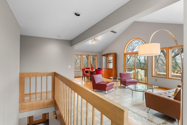 8440 Delaney Ct, Inver Grove Heights, MN 55076 - sitting room featuring vaulted ceiling and baseboards