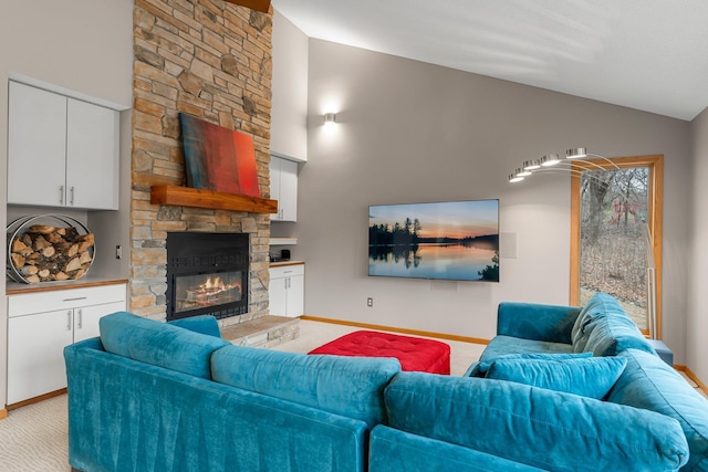 8440 Delaney Ct, Inver Grove Heights, MN 55076 - living room with light colored carpet, a fireplace, baseboards, and high vaulted ceiling