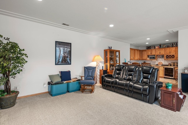 707 Bergman Ct NW, Isanti, MN 55040 - living room with wine cooler, visible vents, bar, and light carpet