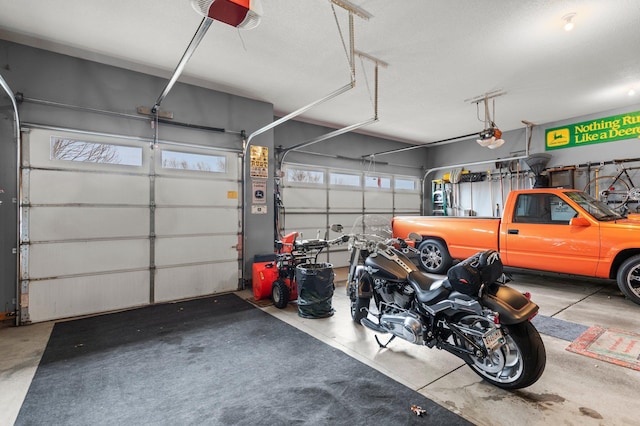 707 Bergman Ct NW, Isanti, MN 55040 - garage with a garage door opener