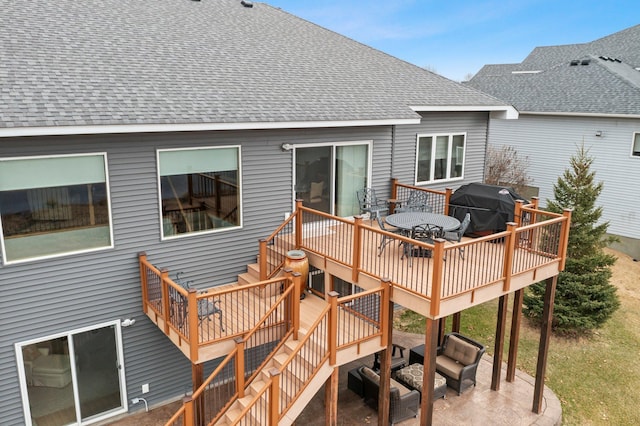 707 Bergman Ct NW, Isanti, MN 55040 - deck with a grill and outdoor dining area