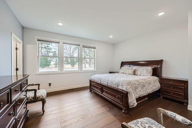 925 Minnesota Ln N, Plymouth, MN 55447 - bedroom featuring baseboards, recessed lighting, and dark wood-type flooring