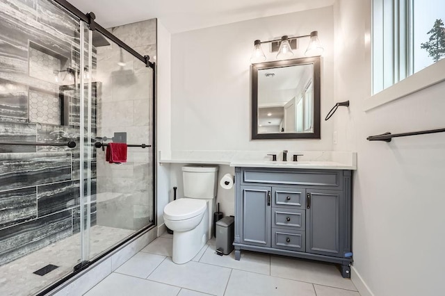 925 Minnesota Ln N, Plymouth, MN 55447 - full bathroom featuring vanity, toilet, tile patterned flooring, and a stall shower
