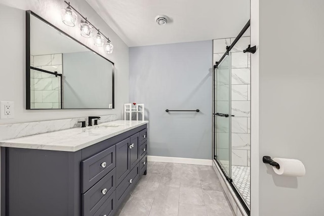 925 Minnesota Ln N, Plymouth, MN 55447 - full bath featuring baseboards, vanity, marble finish floor, and a stall shower