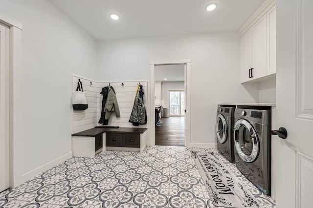 925 Minnesota Ln N, Plymouth, MN 55447 - laundry area with cabinet space, baseboards, recessed lighting, and washer and clothes dryer