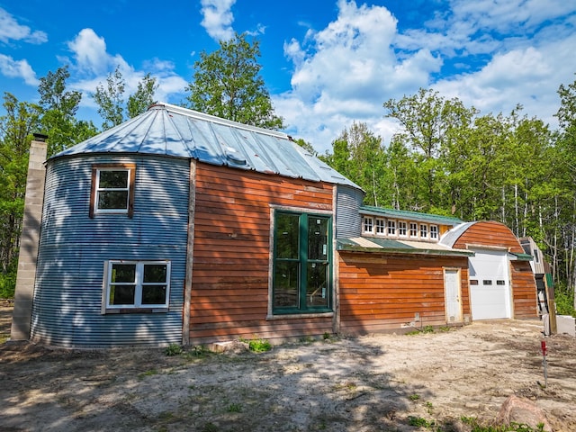 32838 County 16, Hart Lake Twp, MN 56461 - view of front of house with metal roof, a garage, and a standing seam roof