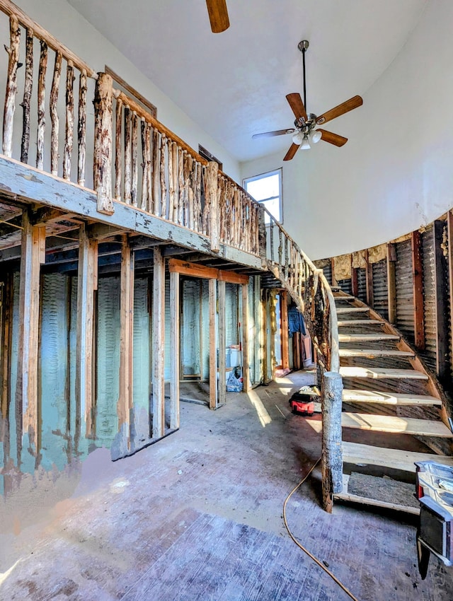 32838 County 16, Hart Lake Twp, MN 56461 - stairs featuring ceiling fan and a towering ceiling