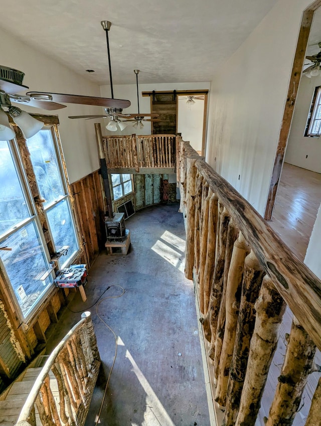 32838 County 16, Hart Lake Twp, MN 56461 - unfurnished living room with ceiling fan and a wood stove