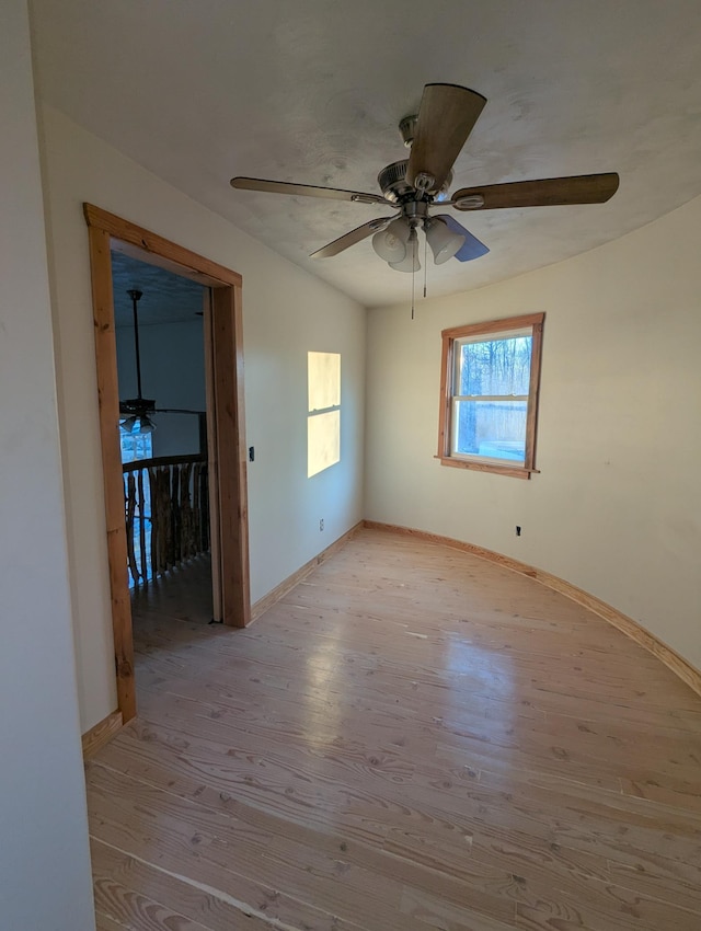 32838 County 16, Hart Lake Twp, MN 56461 - spare room featuring light wood-style flooring, plenty of natural light, and a ceiling fan
