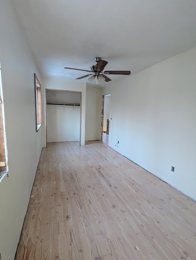 32838 County 16, Hart Lake Twp, MN 56461 - unfurnished bedroom with light wood-style floors, a closet, and ceiling fan