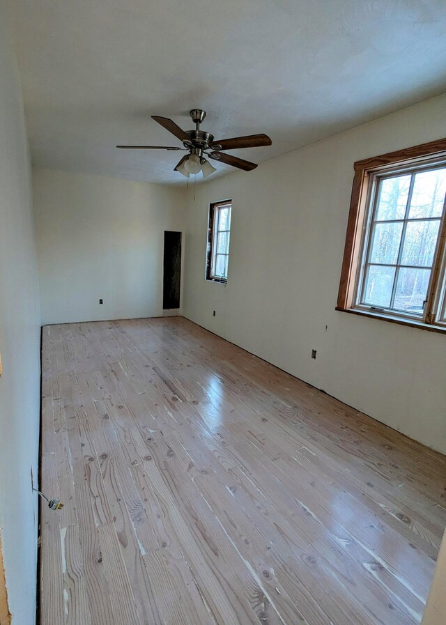 32838 County 16, Hart Lake Twp, MN 56461 - spare room featuring wood finished floors and a ceiling fan