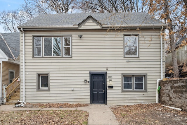 1119 6th St E, Saint Paul, MN 55106 - view of front facade featuring roof with shingles