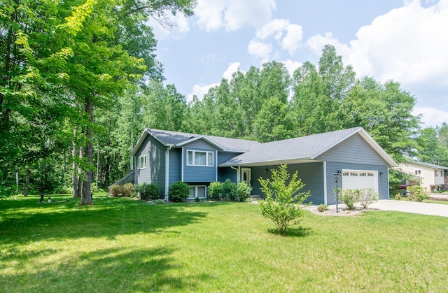 18885 Maryville Rd, Brainerd, MN 56401 - tri-level home with a garage, driveway, a front yard, and roof with shingles