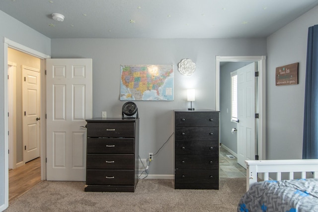 18885 Maryville Rd, Brainerd, MN 56401 - bedroom featuring light carpet and baseboards