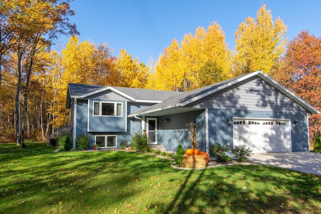 18885 Maryville Rd, Brainerd, MN 56401 - split level home featuring a garage, a front lawn, and driveway