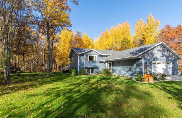 18885 Maryville Rd, Brainerd, MN 56401 - tri-level home with a garage and a front lawn