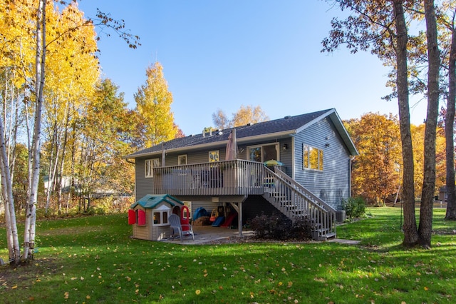 18885 Maryville Rd, Brainerd, MN 56401 - back of house with a yard, stairway, a wooden deck, and a patio area