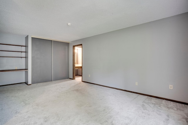 702 Old Settlers Trl Unit 3, Hopkins, MN 55343 - unfurnished bedroom with carpet and a closet