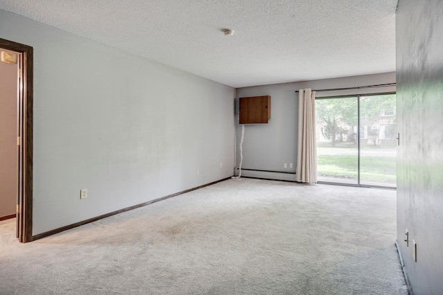 702 Old Settlers Trl Unit 3, Hopkins, MN 55343 - carpeted spare room with a baseboard heating unit and a textured ceiling