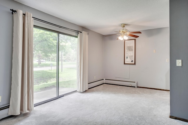 702 Old Settlers Trl Unit 3, Hopkins, MN 55343 - unfurnished room featuring carpet flooring, a ceiling fan, a textured ceiling, and a baseboard radiator