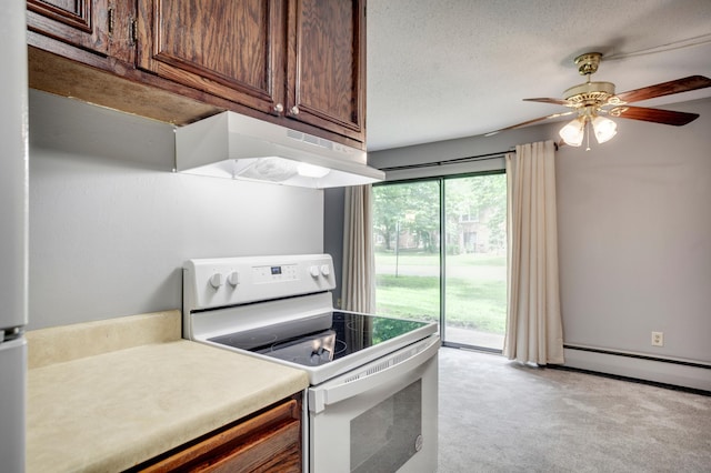702 Old Settlers Trl Unit 3, Hopkins, MN 55343 - kitchen featuring electric range, under cabinet range hood, light carpet, a ceiling fan, and a textured ceiling
