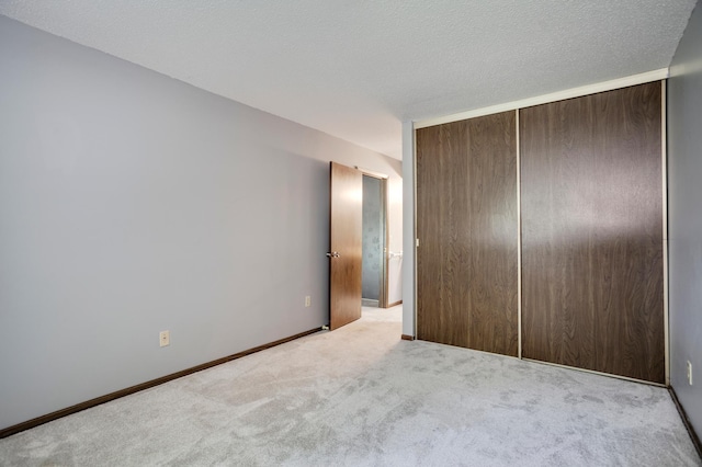 702 Old Settlers Trl Unit 3, Hopkins, MN 55343 - unfurnished bedroom with carpet and a closet
