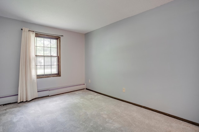 702 Old Settlers Trl Unit 3, Hopkins, MN 55343 - spare room with a baseboard radiator and carpet flooring