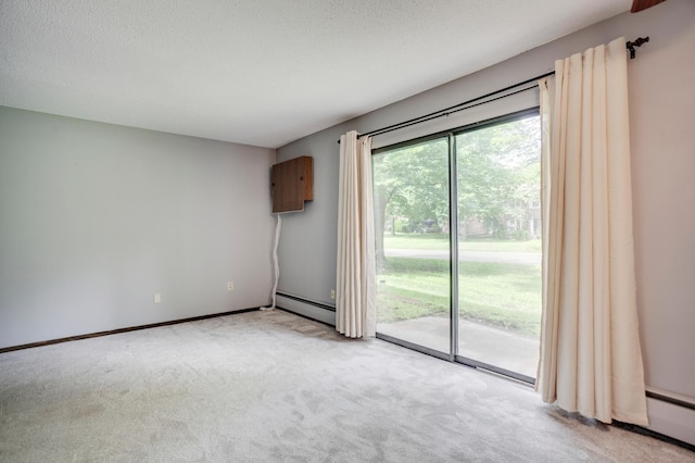 702 Old Settlers Trl Unit 3, Hopkins, MN 55343 - carpeted spare room with a baseboard radiator, a baseboard heating unit, and a textured ceiling