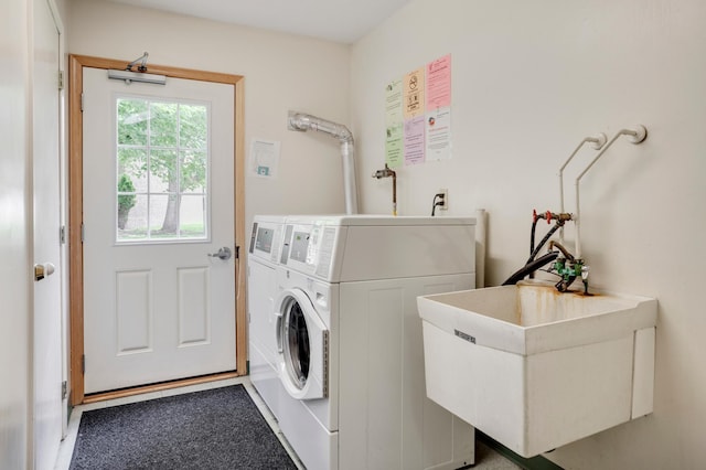 702 Old Settlers Trl Unit 3, Hopkins, MN 55343 - laundry area with a sink and washing machine and clothes dryer
