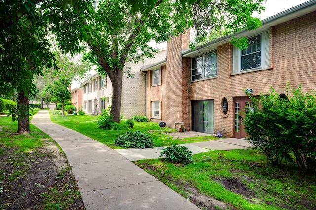 702 Old Settlers Trl Unit 3, Hopkins, MN 55343 - view of community with a lawn