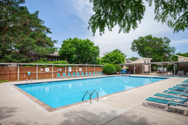 702 Old Settlers Trl Unit 3, Hopkins, MN 55343 - community pool featuring a patio area