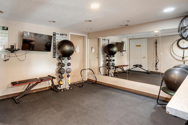 702 Old Settlers Trl Unit 3, Hopkins, MN 55343 - exercise room featuring a textured ceiling and recessed lighting
