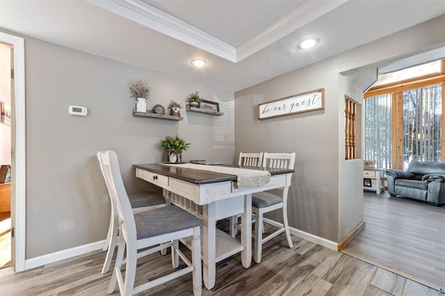 4463 Singkoffer Rd, Summit Twp, WI 54880 - dining area featuring ornamental molding, wood finished floors, baseboards, recessed lighting, and a textured ceiling