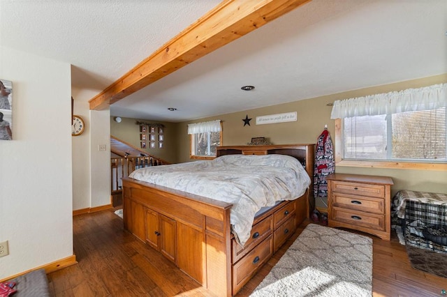 4463 Singkoffer Rd, Summit Twp, WI 54880 - bedroom with dark wood finished floors and baseboards