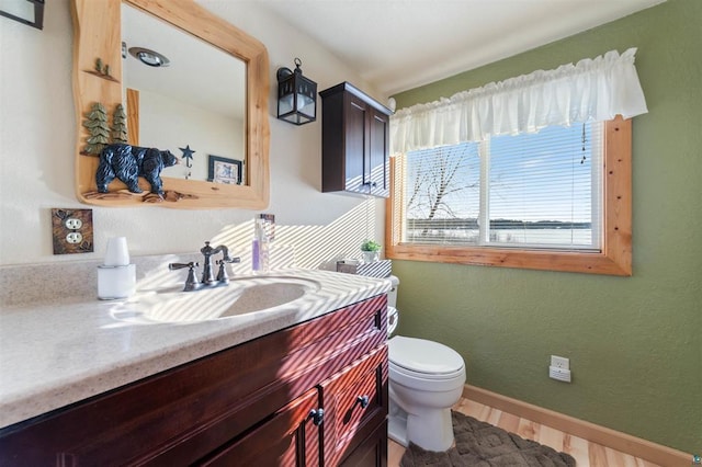 4463 Singkoffer Rd, Summit Twp, WI 54880 - bathroom featuring toilet and vanity