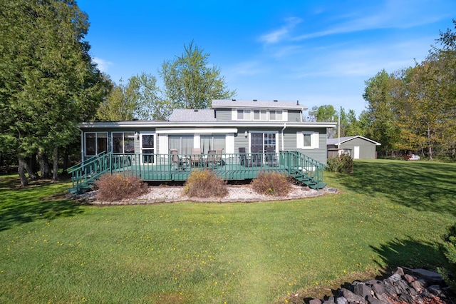 4463 Singkoffer Rd, Summit Twp, WI 54880 - rear view of property with a deck, a lawn, and a sunroom