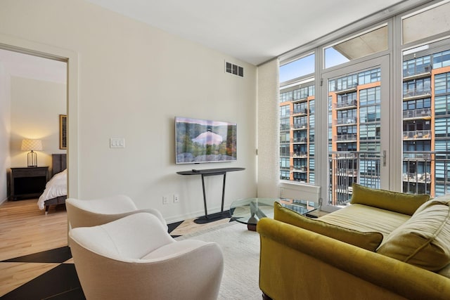 215 10th Ave S Unit 633, Minneapolis, MN 55415 - living area with baseboards and expansive windows