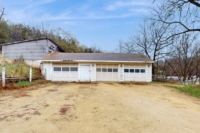 detached garage with fence