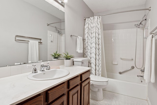 full bathroom featuring tile patterned floors, vanity, toilet, and shower / tub combo