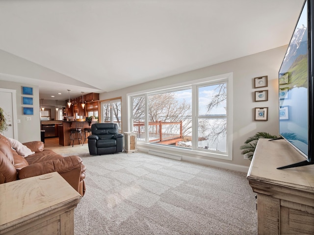 living room featuring light carpet and lofted ceiling