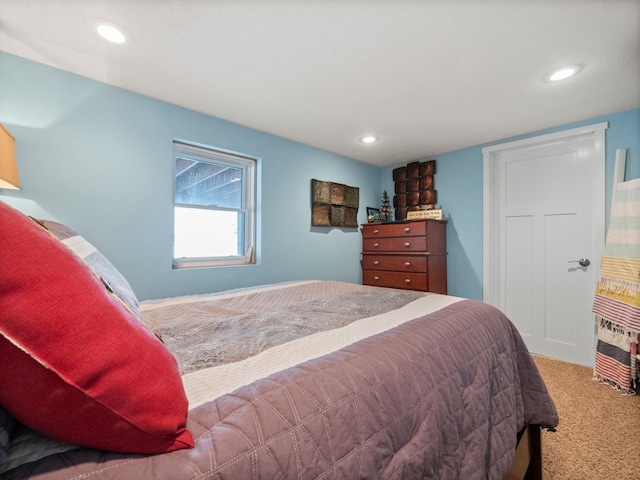 carpeted bedroom featuring recessed lighting