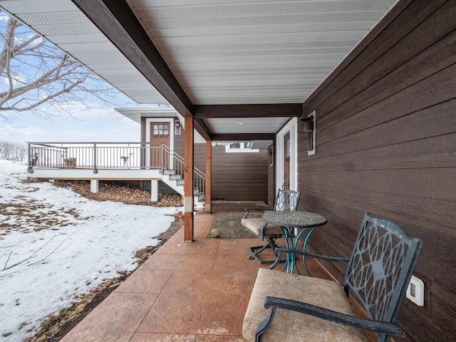 view of snow covered patio