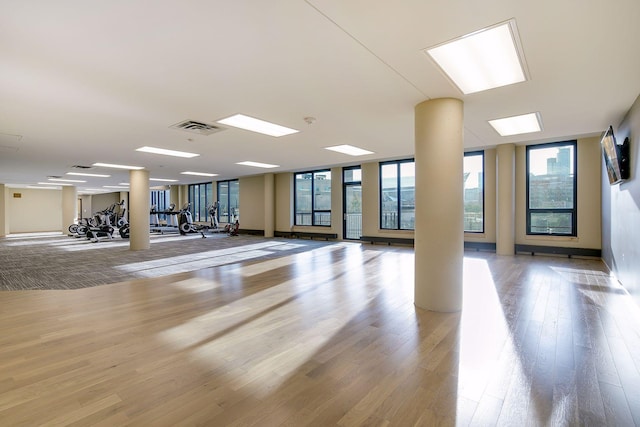 interior space featuring visible vents and wood finished floors