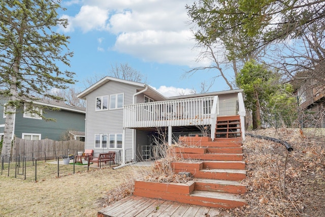 6224 Red Oak Rd, Mound, MN 55364 - back of property featuring a wooden deck and stairway