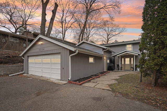 6224 Red Oak Rd, Mound, MN 55364 - view of front of property featuring an attached garage and driveway