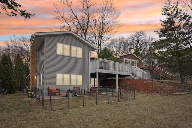 6224 Red Oak Rd, Mound, MN 55364 - back of property featuring stairs, a wooden deck, a fenced backyard, and a patio area